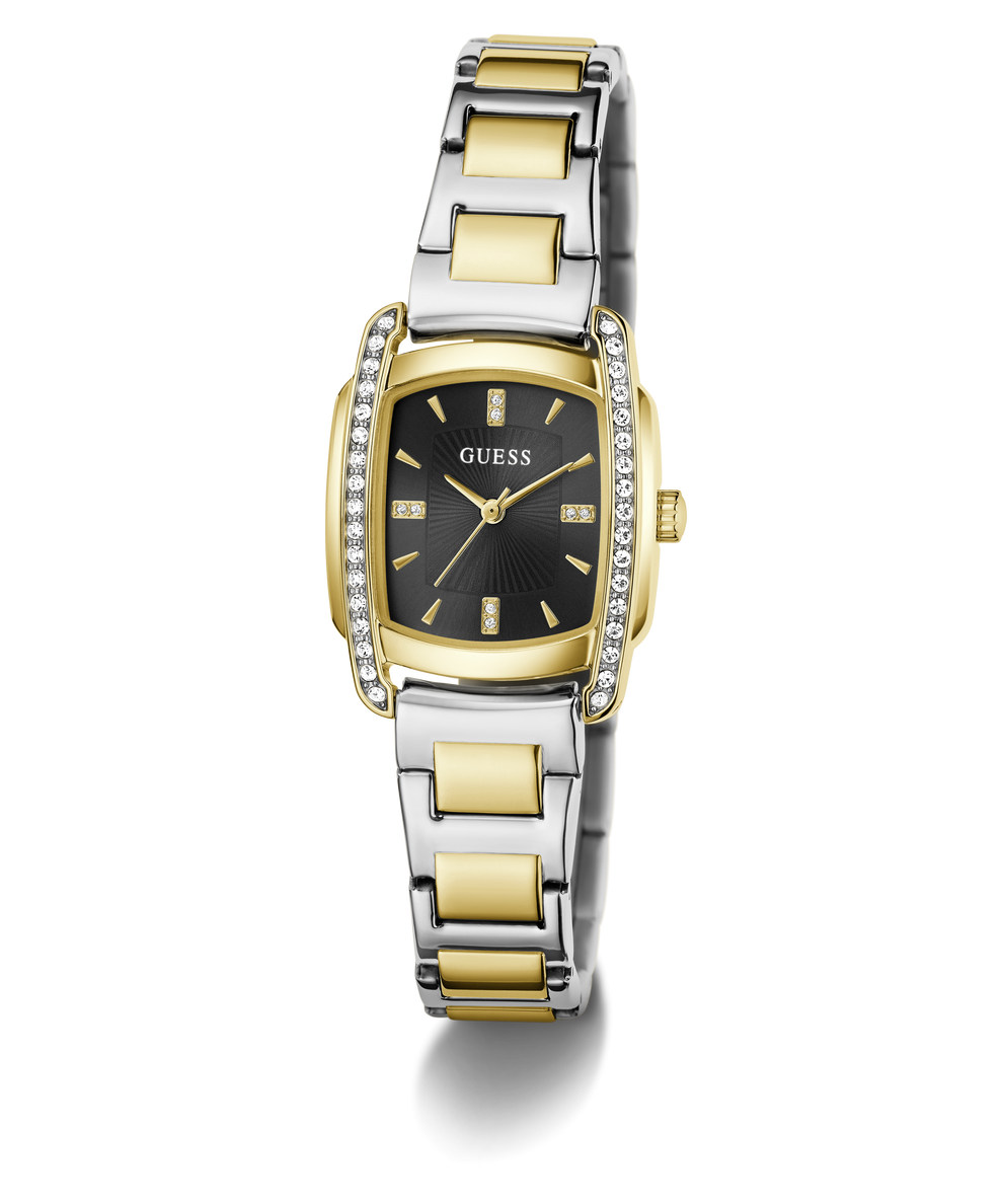 A Guess women's watch featuring a two-tone silver and gold-tone metal bracelet, a gold-tone case, a black dial, and crystal accents on the bezel and lugs, shown on a clean white background.