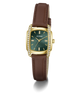 A GUESS women's watch featuring a gold-tone rectangular case with a green dial, crystal-embellished bezel, and a brown leather strap, shown on a white background with a soft shadow.