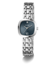 A Guess women's analog watch with a silver-toned metal link bracelet, a square bezel, and a dark slate blue dial featuring Roman numeral VI and a small diamond hour marker.