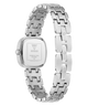 A stainless steel women's analog watch by Guess, shown from the back with its link bracelet and square case visible against a white background.