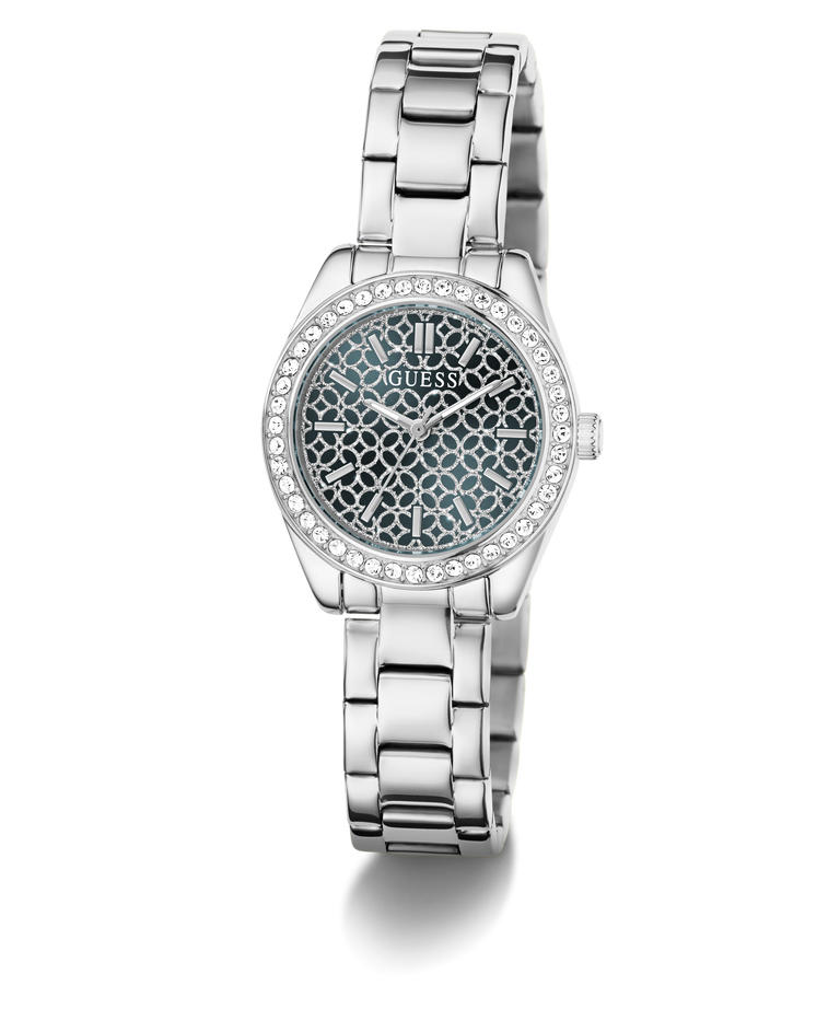A women's Guess wristwatch with a silver-tone metal link bracelet, a bezel encrusted with clear rhinestones, and a blue-gray patterned dial featuring the Guess logo.