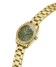 Gold-tone Guess watch with a green marbled dial, crystal-encrusted bezel, and matching gold-tone metal link bracelet on a white background. lifestyle