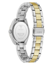 A GUESS women's stainless steel watch with a two-tone silver and gold link bracelet, shown from the back on a white background.