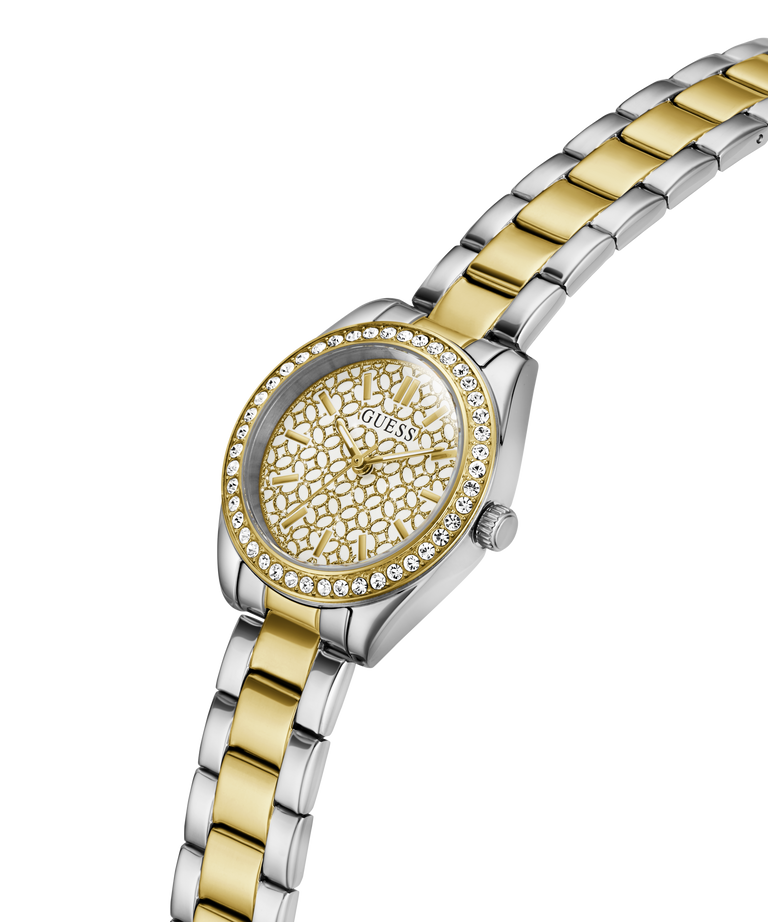 A Guess women's two-tone metal watch with a gold and silver link bracelet, a gold textured dial, and a bezel set with clear crystals, shown on a white background. lifestyle