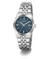 A Guess women's stainless steel watch with a blue dial, silver-tone fluted bezel, and matching steel link bracelet, shown on a clean white background.
