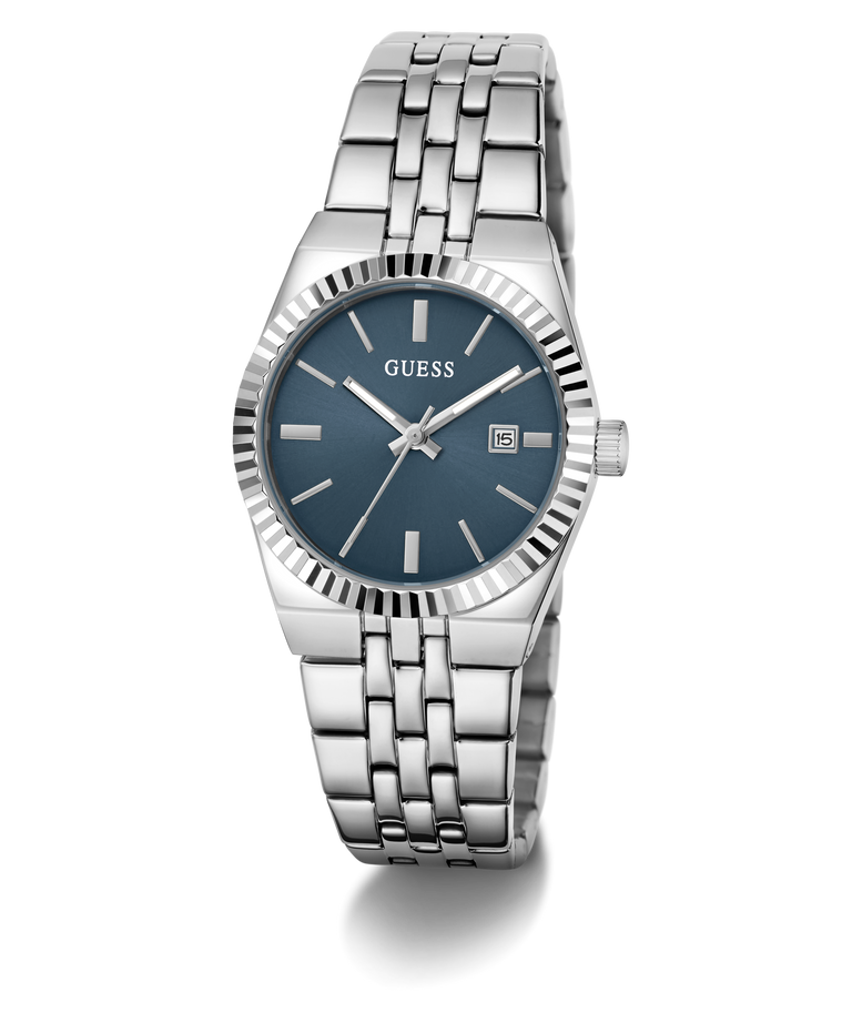 A Guess women's stainless steel watch with a blue dial, silver-tone fluted bezel, and matching steel link bracelet, shown on a clean white background.