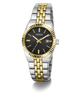 A GUESS women's two-tone stainless steel and gold watch with a black dial, fluted gold bezel, and matching two-tone metal bracelet, shown on a white background.