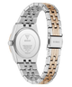 A GUESS women's analog watch shown from the back, featuring a two-tone stainless steel and rose gold link bracelet with a silver-toned case.
