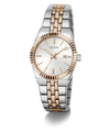 A GUESS women's two-tone stainless steel and rose gold watch with a white dial, fluted bezel, and date window, shown on a clean white background.