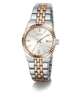 A GUESS women's two-tone stainless steel and rose gold watch with a white dial, fluted bezel, and date window, shown on a clean white background.
