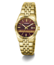 Gold-tone Guess women's watch with a striped brown and burgundy dial, gold-tone case and link bracelet, and a date window at 3 o'clock, shown on a white background with a soft shadow.