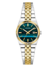 A Guess women's two-tone watch with a silver and gold stainless steel link bracelet, a fluted gold-tone bezel, and a dark green textured dial with gold-tone hands and hour markers.