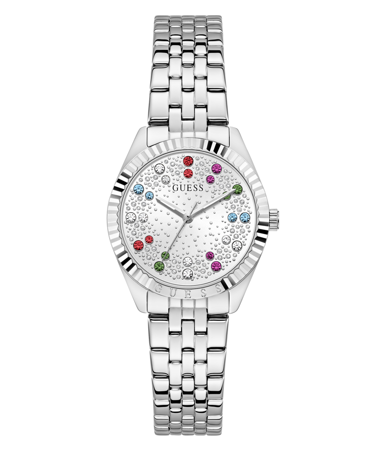 A silver-tone stainless steel wristwatch with a fluted bezel, a white dial embellished with colorful crystal hour markers, and a matching metal link bracelet. The brand name 'GUESS' is visible on the dial.
