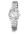 A silver-tone stainless steel wristwatch by Guess with a fluted bezel, a silver-tone link bracelet, and a white dial decorated with tiny floral patterns and colorful crystal hour markers.