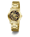A gold-tone Guess wristwatch with a metal link bracelet, a round bezel set with small clear crystals, and a dark patterned dial featuring the Guess logo.