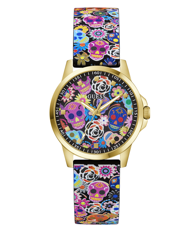 A Guess wristwatch with a gold-tone case and a colorful Day of the Dead patterned strap and dial, featuring sugar skulls, flowers, and butterflies on a white background.