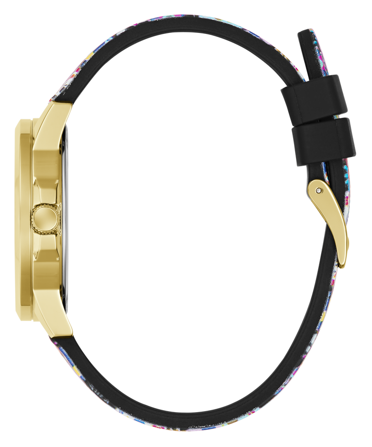 A close-up side view of a watch with a gold-tone case and a black strap featuring a colorful speckled pattern, set against a plain white background.