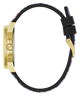 A close-up side view of a watch with a gold-tone case and a black strap featuring a colorful speckled pattern, set against a plain white background.