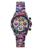 A GUESS brand wristwatch featuring a vibrant, multicolored sugar skull and floral pattern across the black metal case and link strap, with a detailed chronograph dial.