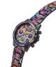 A GUESS wristwatch with a black case and a colorful Day of the Dead sugar skull patterned metal bracelet, shown on a plain white background. lifestyle