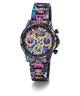 A GUESS women's chronograph watch featuring a vibrant, multicolor sugar skull pattern across the entire case and link bracelet, with a black dial and gold-tone hands.