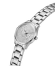 Gold watch with diamond-studded face on a white background lifestyle
