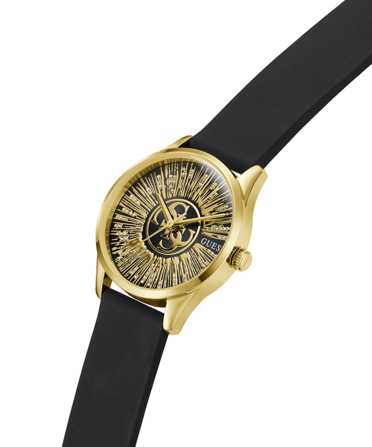A wristwatch with a gold-tone case, a black textured dial featuring a sunburst pattern and the Guess logo, and a black strap, shown on a plain white background. lifestyle
