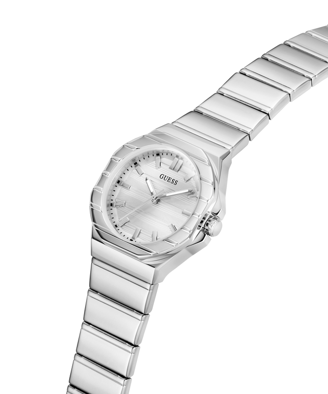 A silver-tone stainless steel women's watch by GUESS, featuring an octagonal bezel, a matching silver dial with bar indices, and a multi-link bracelet, shown on a plain white background. lifestyle