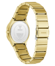 Gold-tone stainless steel watch with a link bracelet, shown from the back on a white background. The back case displays the GUESS logo and specifications, and the clasp is marked GUESS.