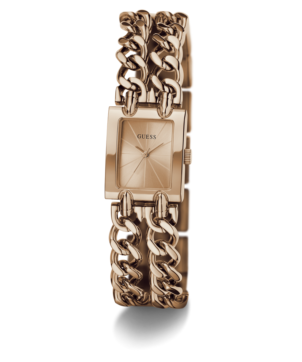 A rose gold-tone women's watch by Guess, featuring a rectangular dial with a sunburst pattern and a multi-link chain bracelet, shown on a clean white background.