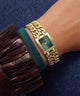 GUESS Ladies Micro Mod Gold Tone Analog Watch on wrist