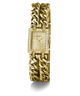 Gold-tone Guess watch with a rectangular crystal-detailed dial and a double-strand curb link bracelet, shown on a white background.