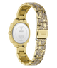 Gold-tone stainless steel watch with an ornate patterned bracelet, shown from the back on a white background. The GUESS brand logo is visible on the watch case back.
