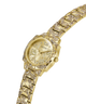 Gold-tone Guess women's watch with an ornate floral patterned metal link bracelet and a matching dial, featuring Roman numeral hour markers. lifestyle