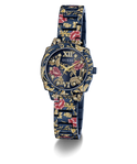A GUESS women's watch featuring a dark blue metal case and link bracelet decorated with a gold floral pattern and red rose accents, set against a plain white background.