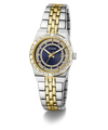 A Guess women's two-tone stainless steel and yellow gold watch with a blue dial, crystal-embellished bezel, and date window, shown on a clean white background.