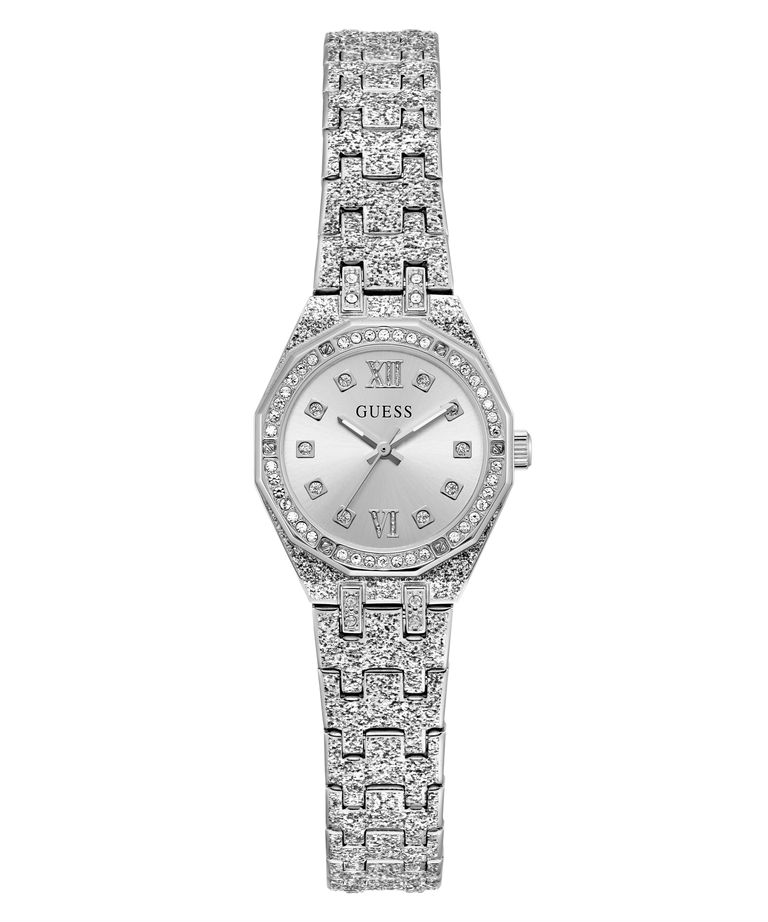 A women's Guess watch with a silver-tone metal bracelet and case, heavily embellished with clear crystals. The silver dial features Roman numeral XII at the 12 o'clock position and crystal hour markers, with the GUESS brand name printed below it.