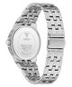 Silver stainless steel wristwatch shown from the back, featuring a matching metal link bracelet and a clear back cover with GUESS branding and specifications.