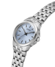 A GUESS men's watch featuring a silver stainless steel case and integrated link bracelet, with a light blue dial and black indices. lifestyle