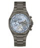 A GUESS chronograph watch with a dark gray metal bracelet and case, featuring a light blue dial with white and gray sub-dials.