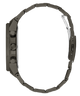 A close-up side view of a smartwatch with a dark metallic link band, showing the side buttons and a silver-toned inner clasp on a plain white background.