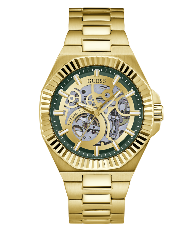 Gold-tone Guess automatic watch with a skeleton dial, green inner ring, and gold link bracelet on a white background.