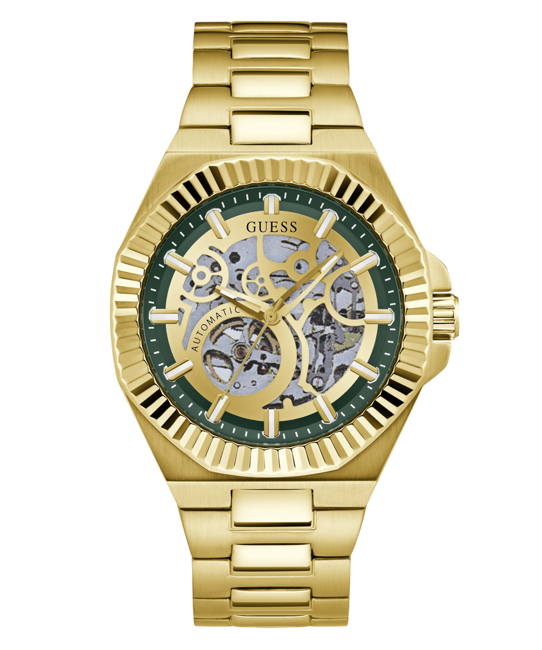 Gold-tone Guess automatic watch with a skeleton dial, green inner ring, and gold link bracelet on a white background.