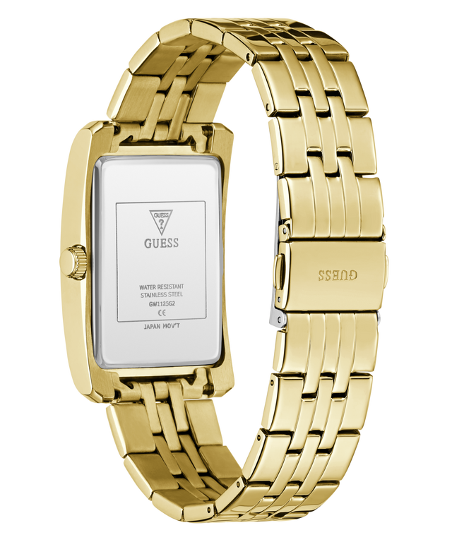 Gold-tone stainless steel women's watch with a rectangular case and matching metal link bracelet, shown on a white background. The back of the case is visible with GUESS branding and technical specifications, and the clasp also shows the GUESS logo.