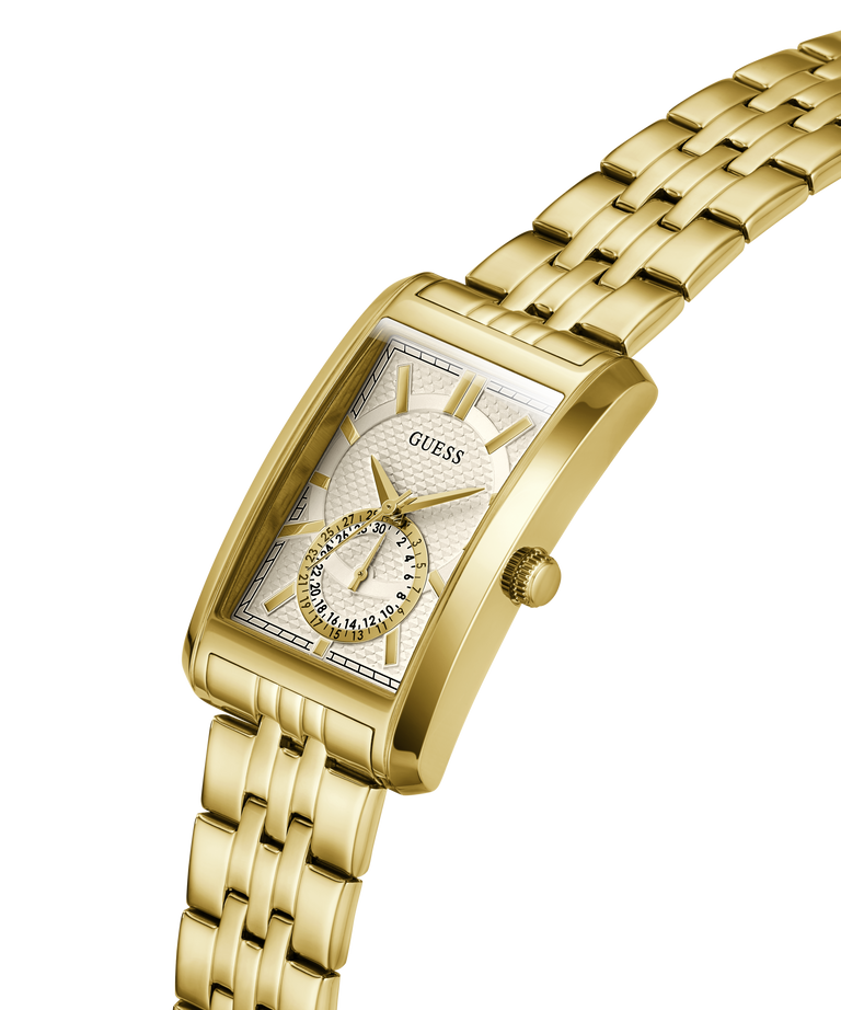 Gold-tone rectangular Guess watch with a silver-white dial, featuring a small sub-dial and a matching gold-tone metal link bracelet on a white background. lifestyle