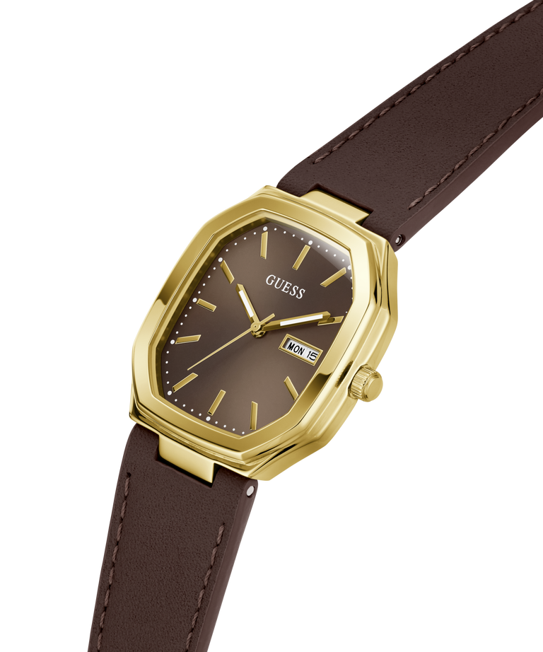 A Guess wristwatch with an octagonal gold-tone case, a dark brown dial, and a matching brown leather strap, shown on a plain white background. lifestyle