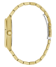 A close-up side view of a gold-tone watch with a matching metal link bracelet, showing the case, crown, and clasp on a plain white background.