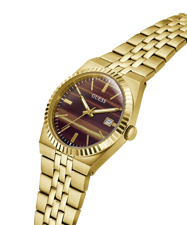 Gold-tone Guess wristwatch with a brown striped dial and a matching gold-tone metal link bracelet, shown on a plain white background. lifestyle