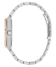A close-up side profile of a silver-toned metal link bracelet watch with a two-tone beige and silver case, set against a plain white background.