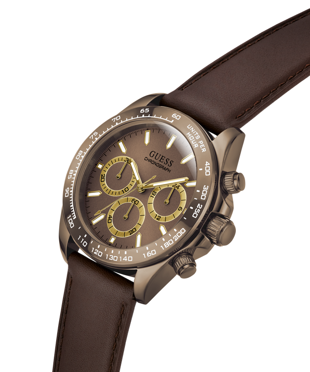 A Guess Chronograph watch with a dark brown dial, brown leather strap, and a bronze-toned case with gold-tone accents on the subdials and hands. lifestyle